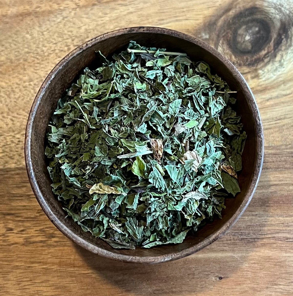 Spearmint Leaf tea Close up in wooden bowl