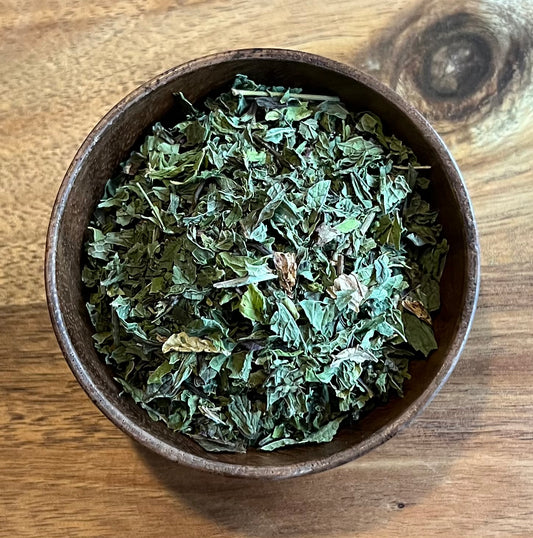 Spearmint Leaf tea Close up in wooden bowl